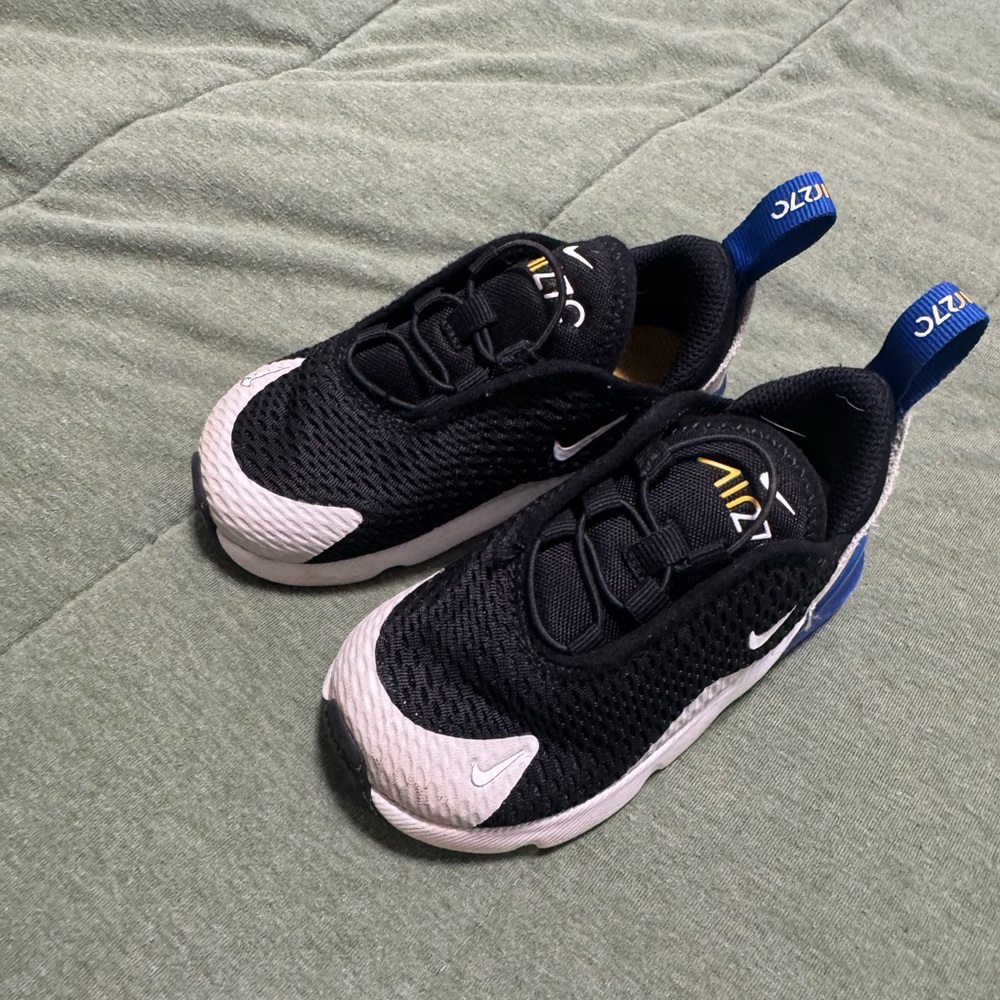 Nike Kids Black and White Sneakers with Blue Accents